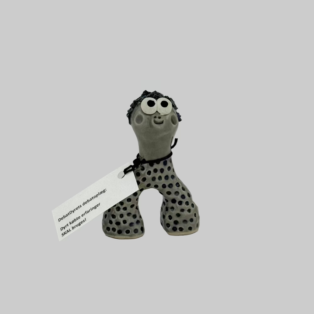 Håndlavet keramik debatdyr med store øjne og prikker